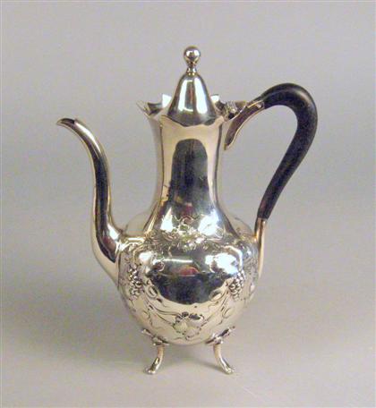 Appraisal: American sterling silver chocolate pot Decorated with bacchic vines with