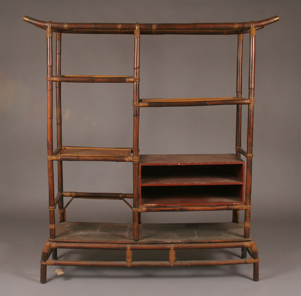 Appraisal: Oriental style display cabinet bamboo framework woven tray shelving brass