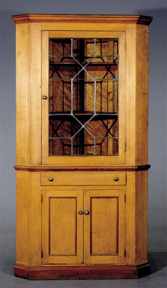 Appraisal: American maple corner cupboard late th early th centurymolded cornice