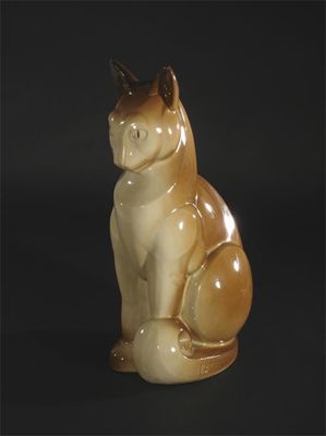 Appraisal: An Art Deco Lemanceau pottery cat modelled seated signed in