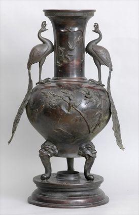 Appraisal: JAPANESE BRONZE MASSIVE VASE The tripod bowl applied with song