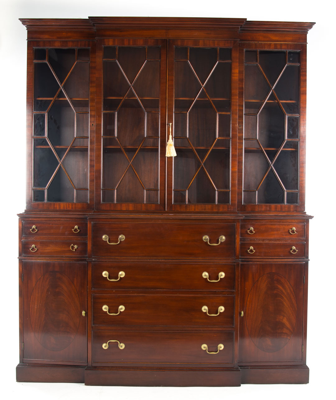 Appraisal: Chippendale style carved mahogany breakfront flat molded cornice compartments with