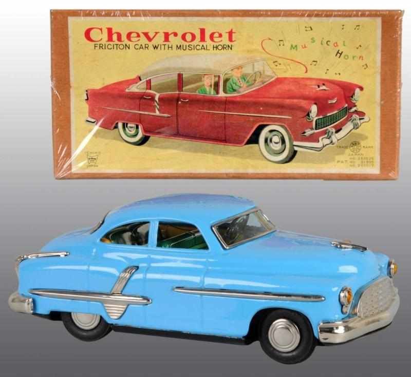 Appraisal: Tin Musical Chevrolet Auto Friction Toy Description Japanese Circa Working