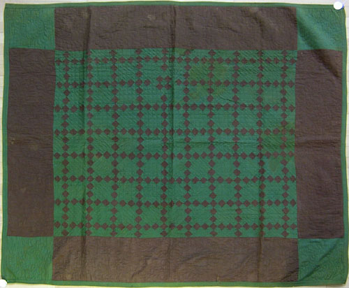 Appraisal: Amish pieced green and brown quilt ca in the single