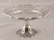 Appraisal: A silver tazza with broad pierced Art Nouveau border and