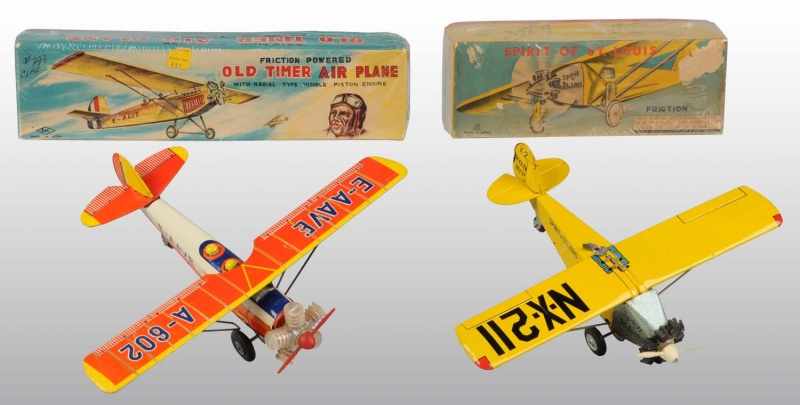 Appraisal: Lot of Tin Airplane Friction Toys Description Japanese Working Includes