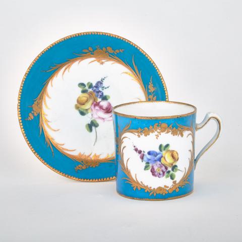 Appraisal: S vres Coffee Can and Saucer th century painted in