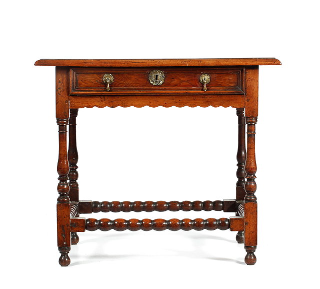 Appraisal: A TH CENTURY OAK SIDE TABLE the rectangular top with