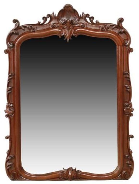 Appraisal: Monumental Italian mahogany mirror th c carved rocaille crest over