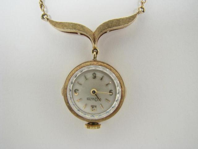 Appraisal: LeCoultre k yellow gold pendant watch necklace chain is approximately