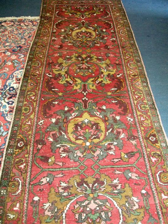 Appraisal: Red ground persian runner with multiple borders and repeating floral