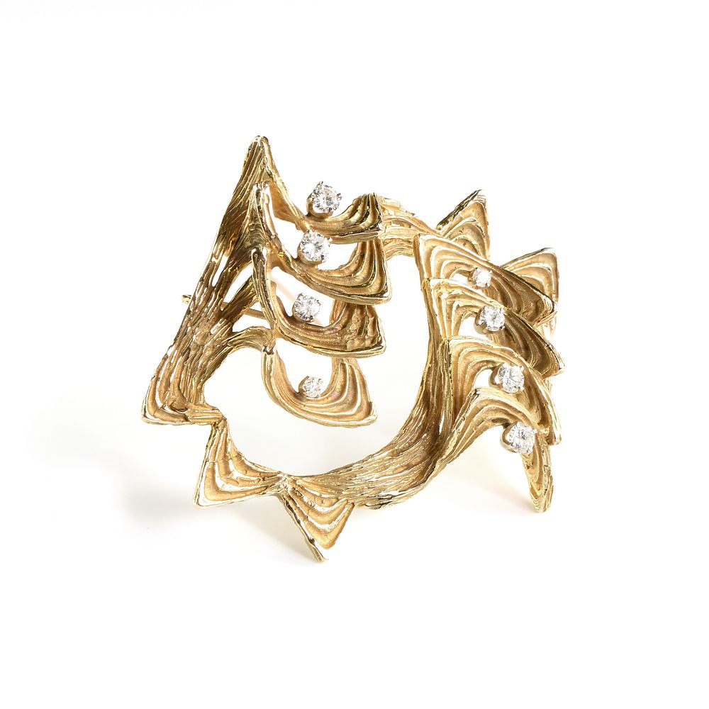 Appraisal: A MODERNIST DIAMOND AND K YELLOW GOLD BROOCH A MODERNIST