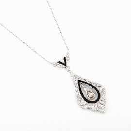 Appraisal: An ct white gold diamond and onyx pendant necklace estimated