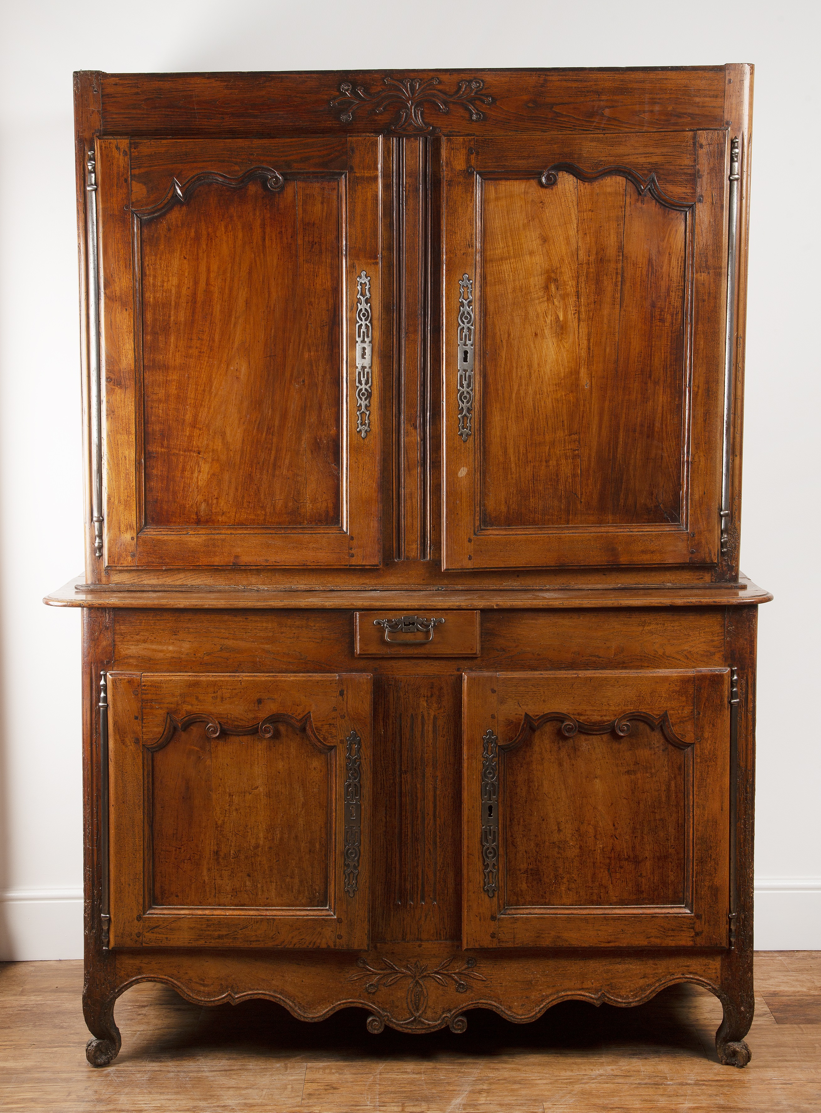 Appraisal: Walnut cabinet in two parts meuble deux corps French late