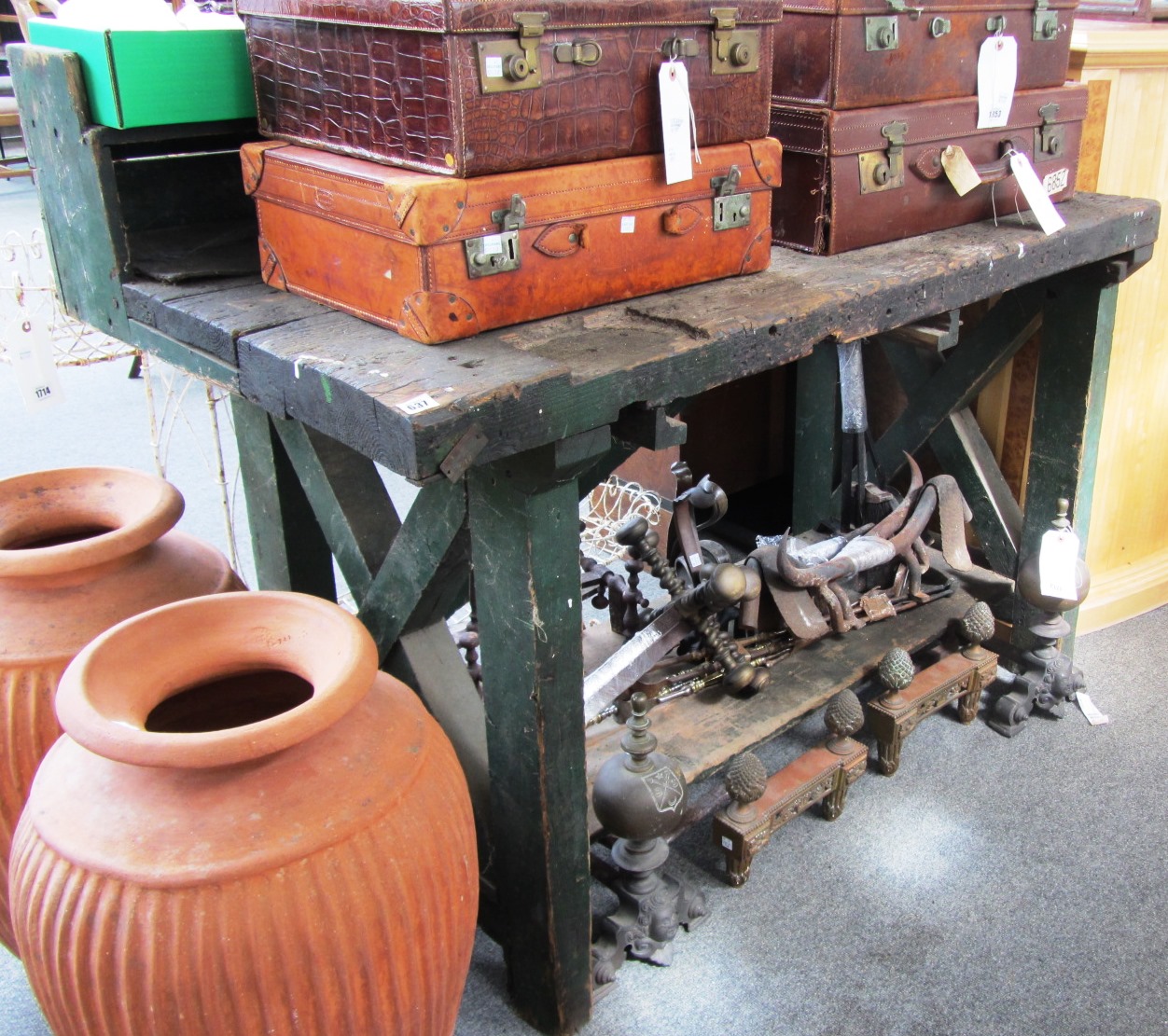 Appraisal: A green painted pine shelf backed work bench cm wide