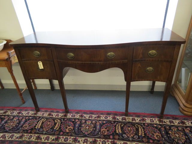 Appraisal: Mahogany Sideboard middle drawer with side doors wide