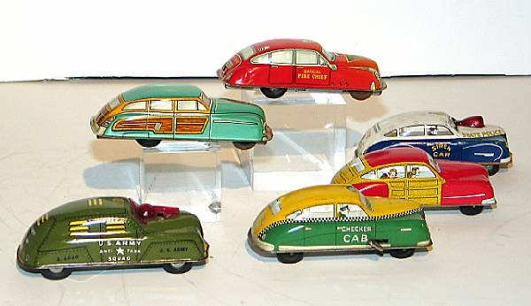 Appraisal: Tin Lithographed transportation toys Colorful s era toys from American