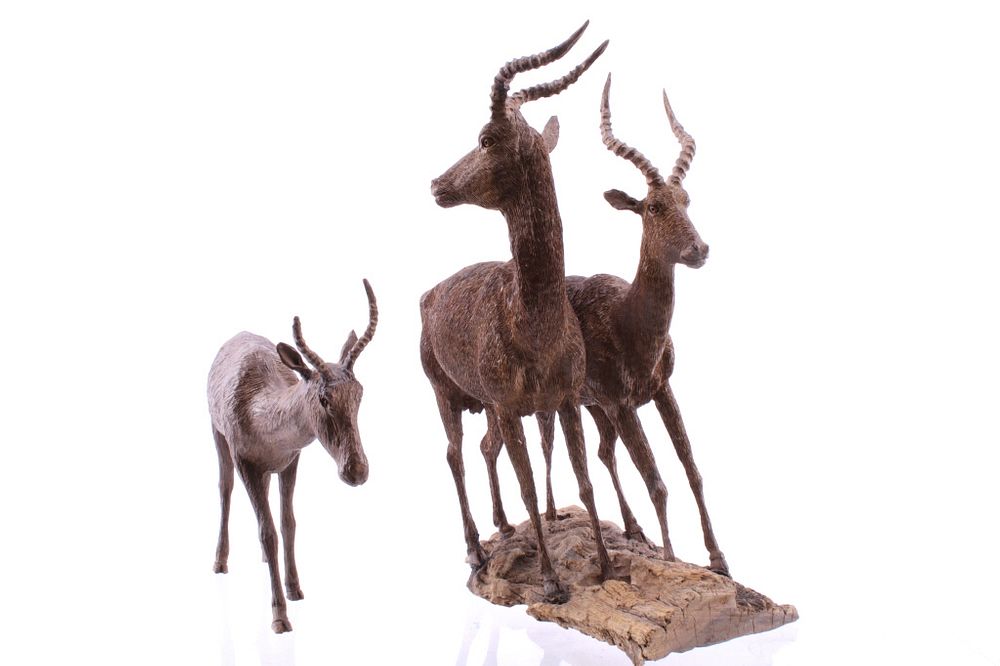 Appraisal: South African Carved Leadwood Impala Collections Featured in this lot