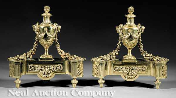 Appraisal: A Pair of Empire-Style Gilt Brass Andirons c urn standard