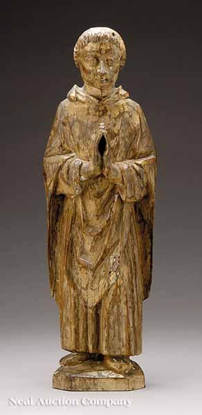 Appraisal: A Continental Wood Wall-Mounted Sculpture of a Monk early th