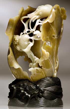 Appraisal: OPENWORK CARVED JADE GROUP Very unusual and remarkably carved Chinese