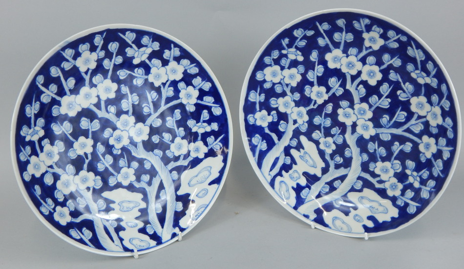 Appraisal: A pair of thC Japanese porcelain chargers each modelled with