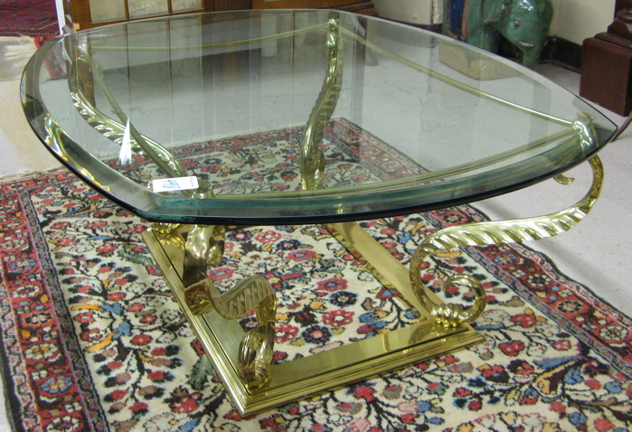 Appraisal: CONTEMPORARY GLASS AND BRASS COFFEE TABLE having an oblong clear