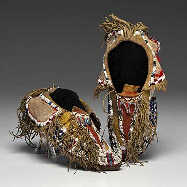 Appraisal: Kiowa Beaded Hide Moccasins sinew-sewn and beaded using colors of