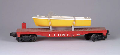 Appraisal: LIONEL FLAT CAR With yellow and white motorboat CONDITION Very