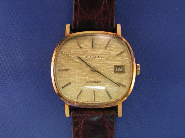 Appraisal: A Juvenia gentleman's ct gold automatic wristwatch with a leather