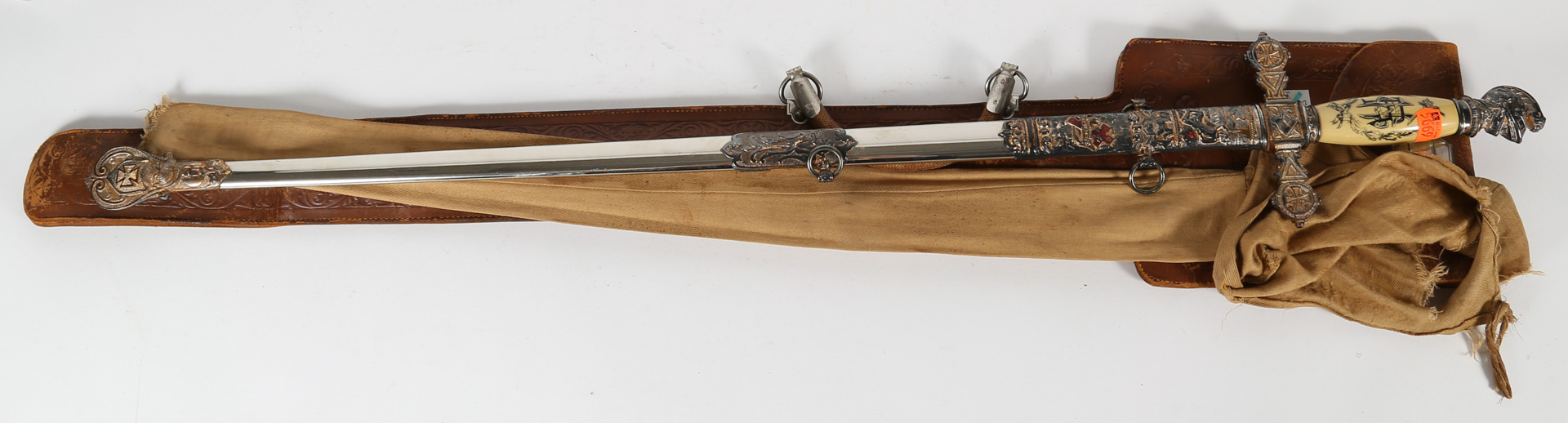 Appraisal: Fraternal sword with scabbard and leather case Undernumber