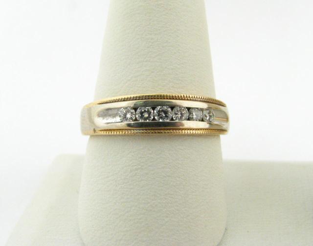 Appraisal: Gentleman's K yellow and white gold bead motif band with