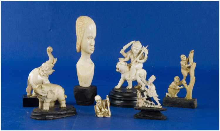 Appraisal: Collection Of Ivory And Bone Carvings Comprising Elephants African Bust