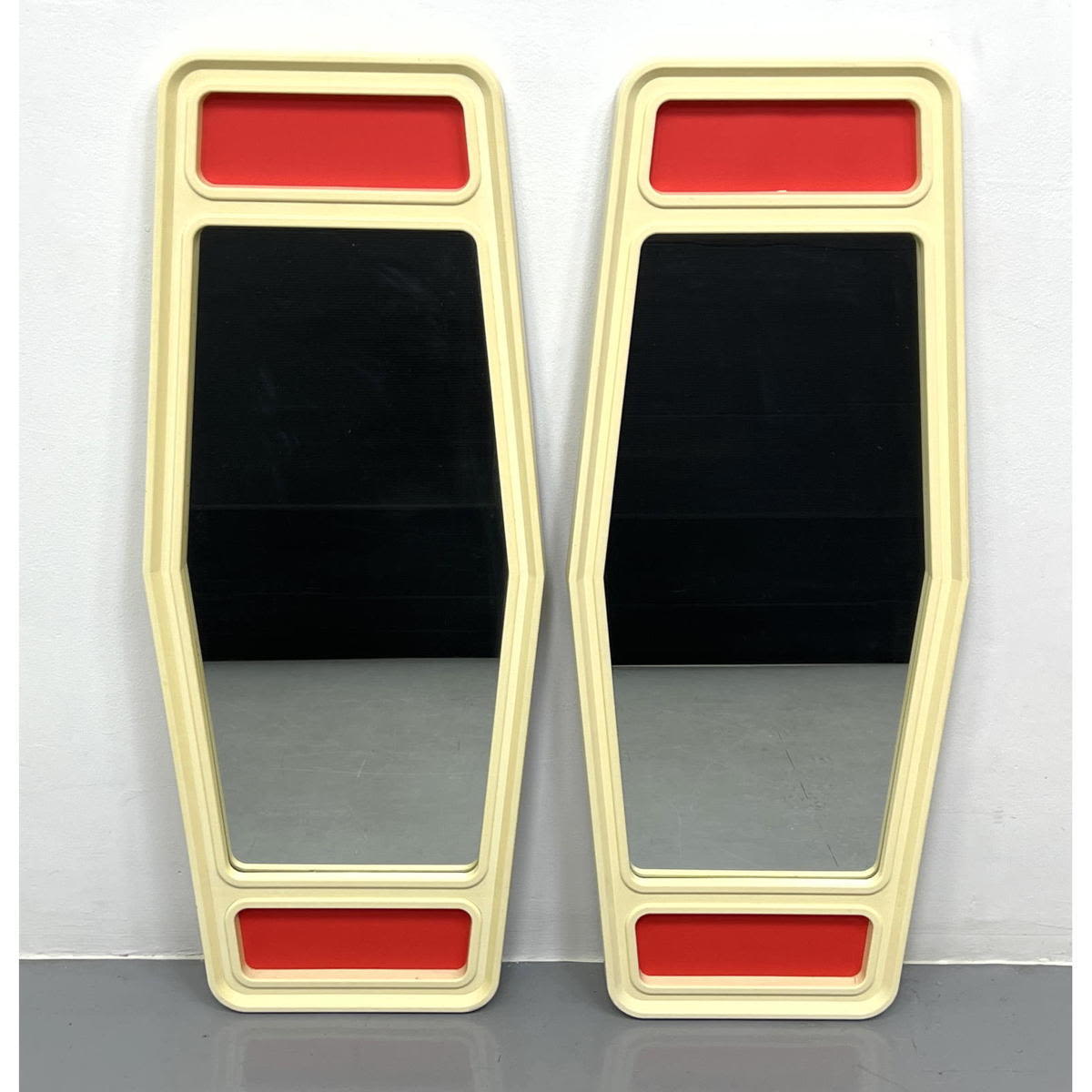 Appraisal: Pr Cream Molded Plastic Framed Wall Mirrors Red Accent Trim