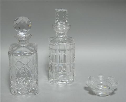 Appraisal: LALIQUE DISH AND TWO CRYSTAL DECANTERS The dish of low