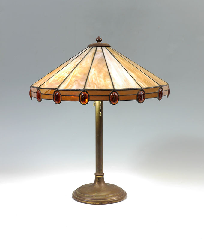 Appraisal: LEADED SLAG GLASS TABLE LAMP Unmarked brass base with socket