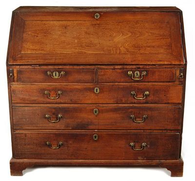 Appraisal: A George III mahogany bureau with a fitted interior of