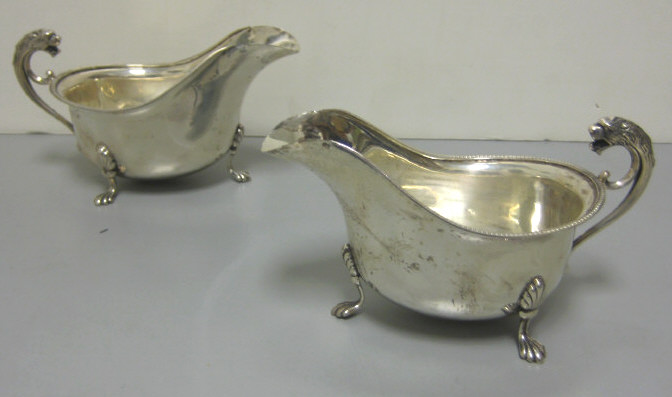 Appraisal: BARKERS BROS LTD BIRMINGHAM Pair of English silver sauce boats