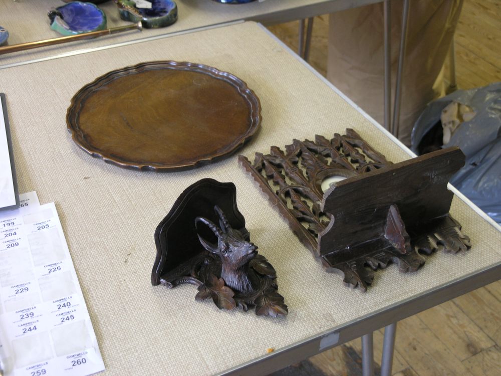 Appraisal: An assortment of carved wood wall brackets including a bracket