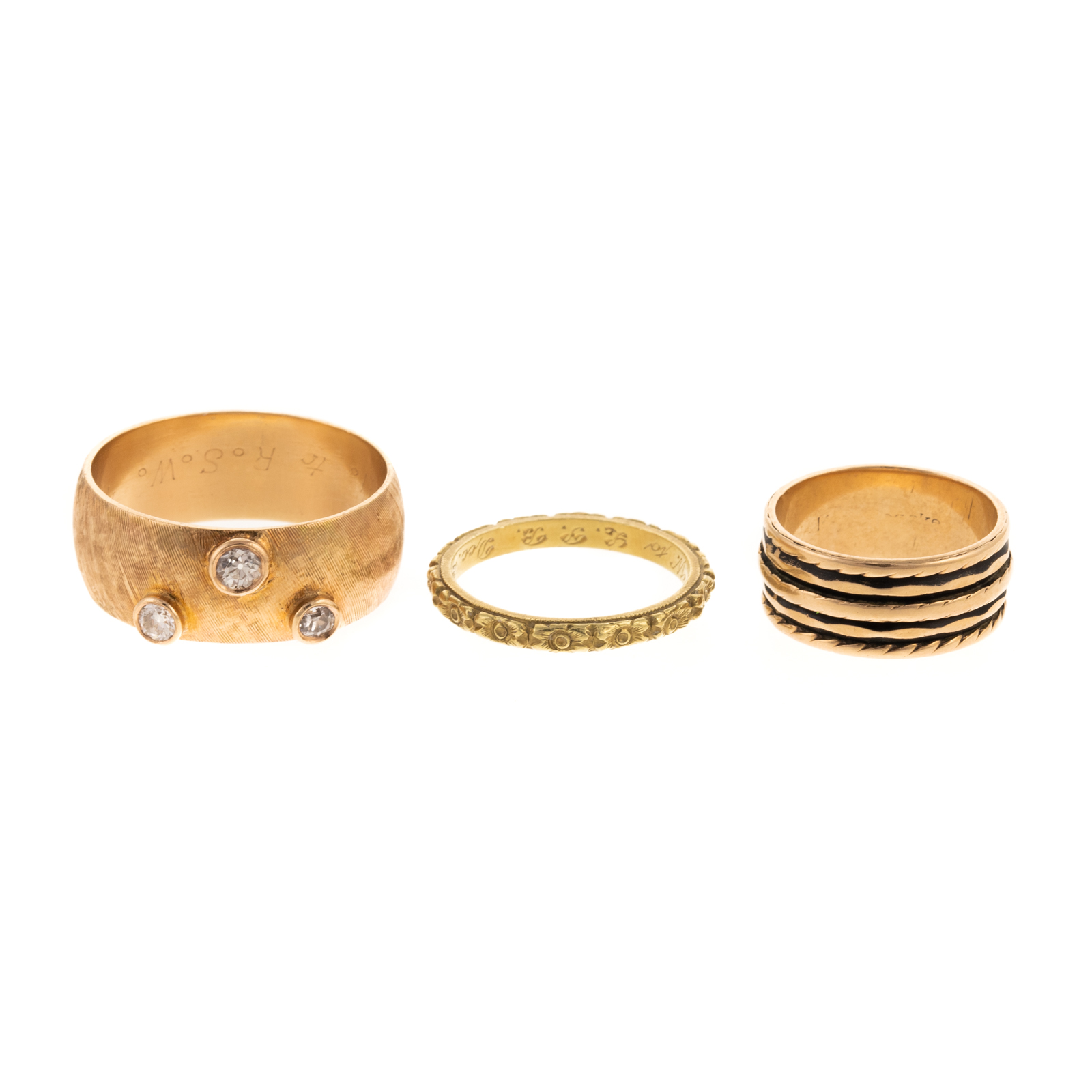 Appraisal: A TRIO OF BANDS IN K GOLD K yellow gold