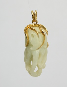 Appraisal: A Carved Jade Pendant of Buddha's Hand Citron A carved