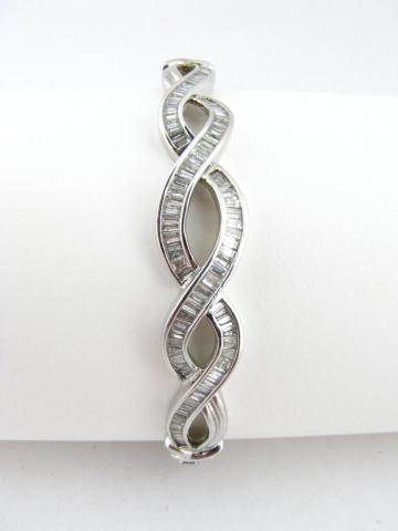 Appraisal: k White Gold Hinged Bangle ct total weight baguette Diamond