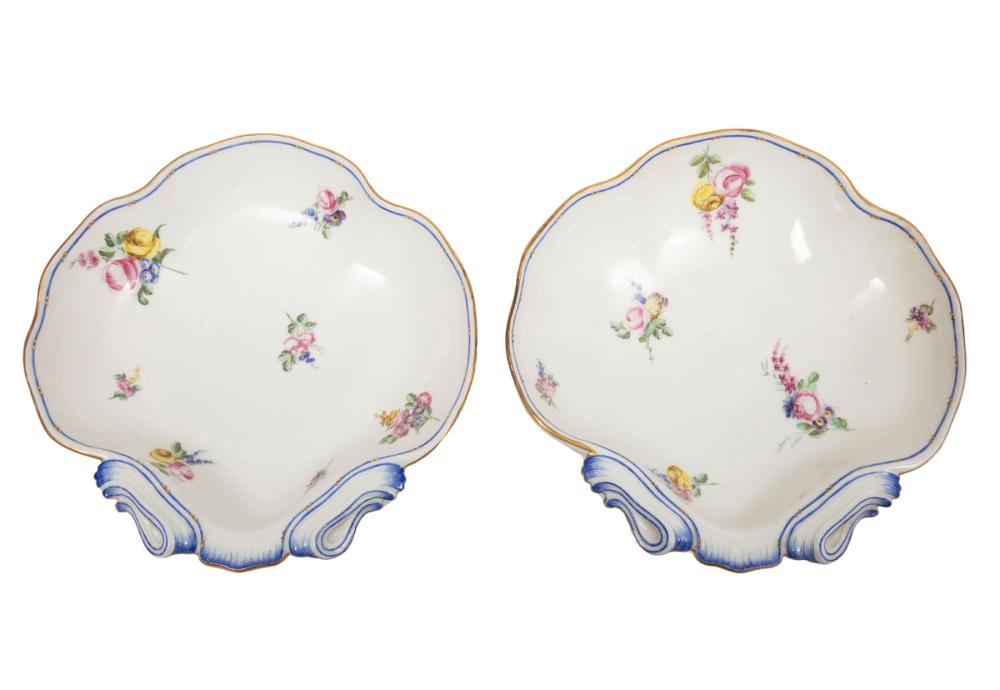 Appraisal: Pair of Sevres Porcelain Shell-Form Dishes interlaced L's date letter