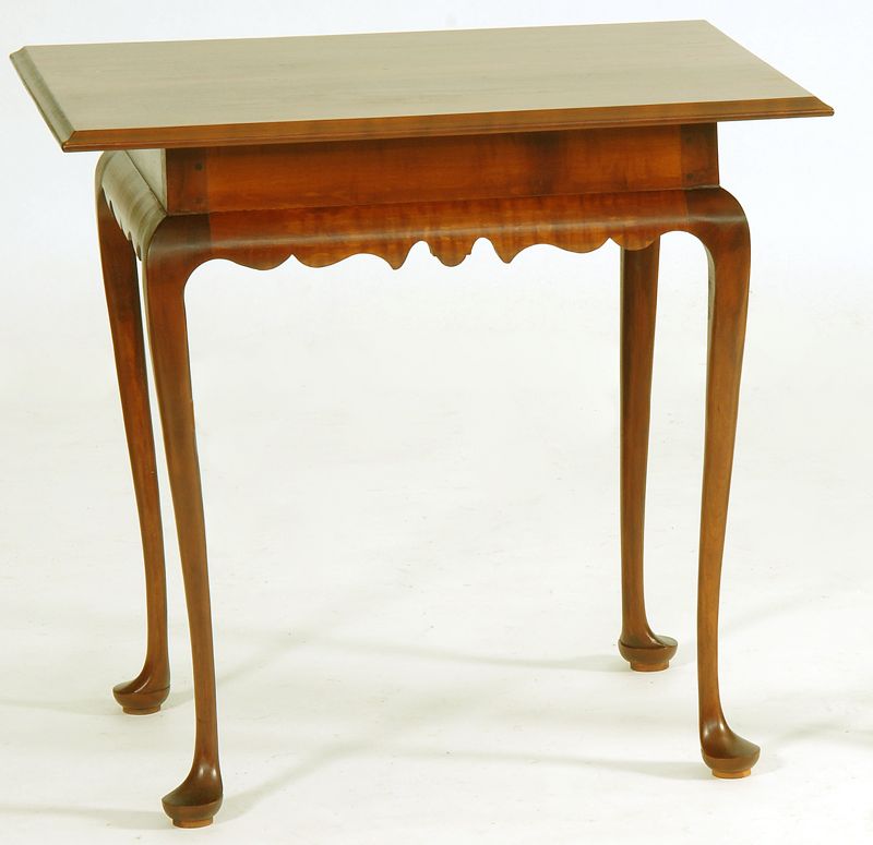 Appraisal: ELDRED WHEELER QUEEN ANNE-STYLE TEA TABLE In maple and tiger