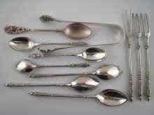 Appraisal: Three pairs of sweetmeat spoons and forks three teaspoons and