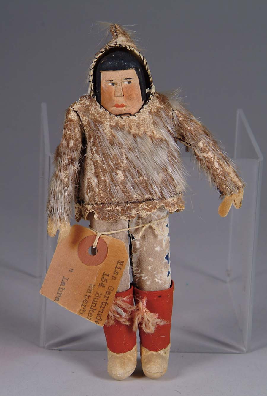 Appraisal: LABRADORIAN ESKIMO DOLL Wonderful Eskimo doll has carved wooden face