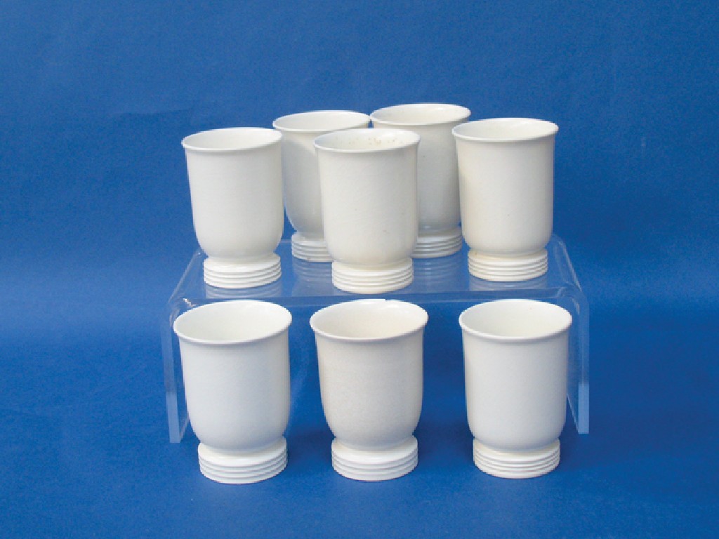 Appraisal: A SET OF EIGHT WEDGWOOD KEITH MURRAY MOONSTONE SMALL BEAKERS