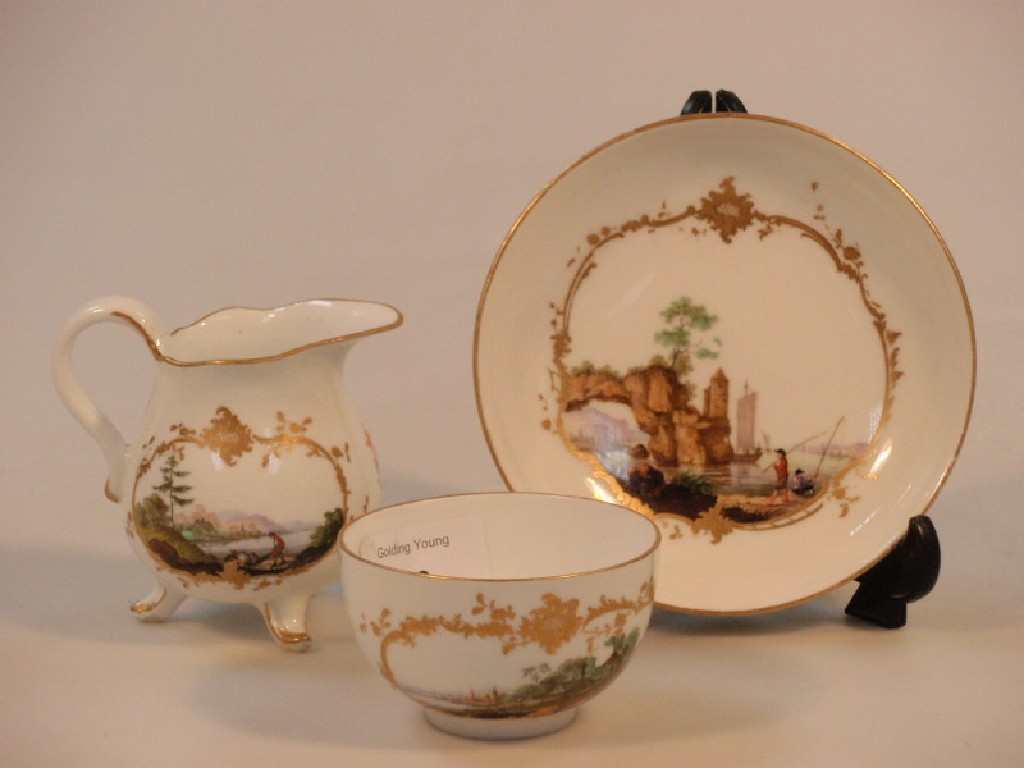 Appraisal: A Meissen porcelain cup and saucer and matching cream jug