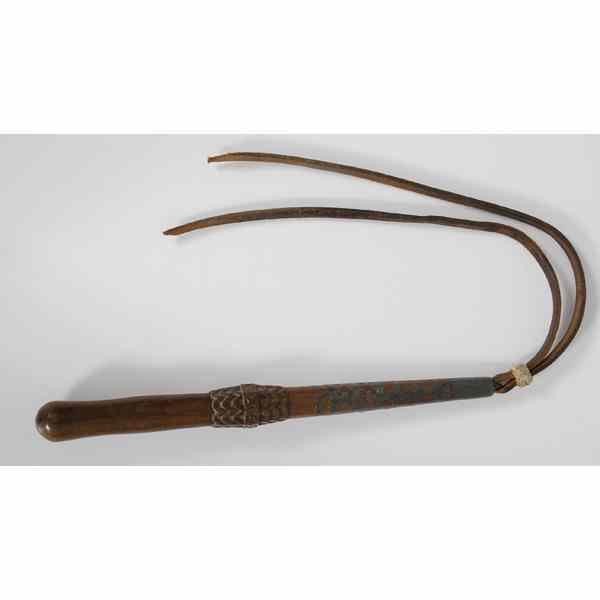 Appraisal: Western Inlaid Wooden Quirt turned wooden handle with chip-carved decorations