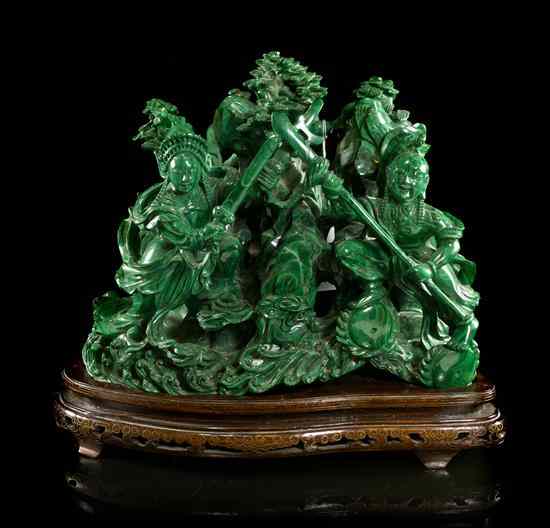 Appraisal: A Large Malachite Figural Carving depicting two warriors at the